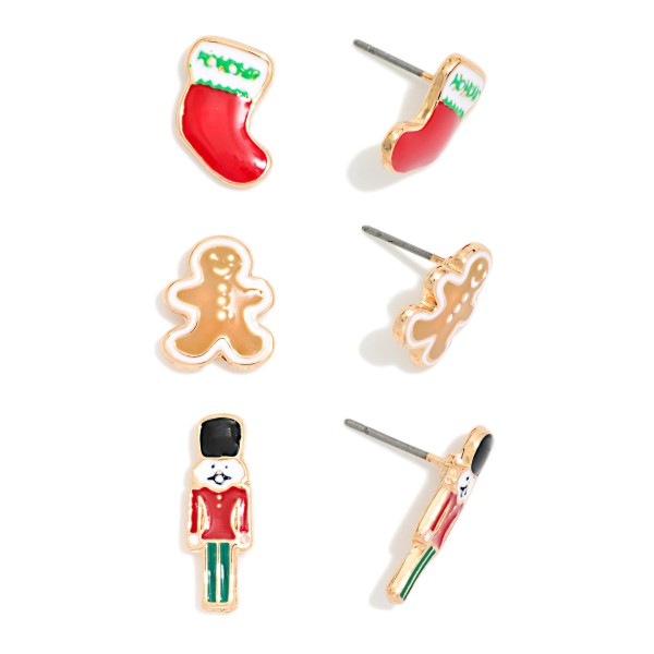 Holiday Classics Stud Earring Set with three pairs of glossy enamel studs: a cozy stocking, a smiling gingerbread man, and a toy soldier nutcracker. Petite posts keep each pair light and comfortable for all day wear. Perfect for rotating festive looks through the season or splitting into stocking stuffers, teacher gifts, and gift exchange extras. A nostalgic, affordable set that boutique shoppers grab by the handful in December.