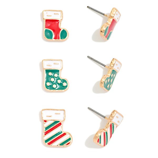 Christmas Stocking Stud Earring Set with three pairs of mini enamel stockings in classic, snowflake print, and candy stripe designs, each topped with a fluffy cuff. Petite posts keep them light and comfortable for all day wear. A sweet way to mix and match holiday style, and an easy set to split into stocking stuffers, classroom gifts, or gift exchange add ons. Affordable and adorable, stud sets like this sell fast all season.