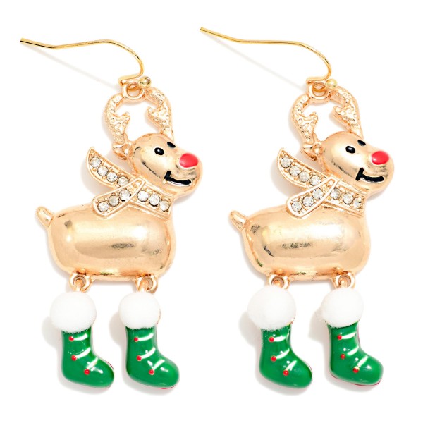 Rhinestone Reindeer Stocking Drop Earrings featuring a cheerful reindeer with sparkling rhinestone antlers and scarf, a shiny button nose, and dangling enamel stocking legs topped with fluffy pom trim. The movable stocking charms swing with every step for a playful, festive look on lightweight fishhook wires. A crowd pleaser for Christmas parties, school events, and holiday photos. Whimsical character earrings like these are top holiday impulse buys.
