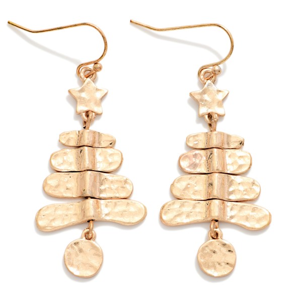 Hammered Metal Christmas Tree Drop Earrings featuring stacked, hammered tiers topped with a tiny star and finished with a dangling round ornament charm. The worn, burnished finish gives a rustic, vintage feel that pairs perfectly with sweaters, flannels, and boots. A charming pick for farmhouse and western boutiques, holiday markets, and gift exchanges. Lightweight on fishhook wires, these sell easily as stocking stuffers and impulse adds.