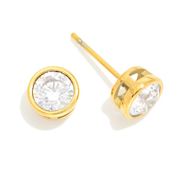 Circle Rhinestone With Metal Tone Border Stud Earrings 

- Stainless Steel 
- Water Resistant 
- Approximately .25" D
