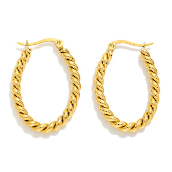 Twisted Metal Oval Hoop Earrings 

- Stainless Steel 
- Water Resistant 
- Approximately 1.25" L X .75" D