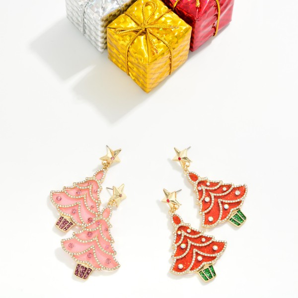 Glitter Christmas Tree Drop Earrings with a polished star post top, rhinestone garland trim and faux pearl ornaments on a sparkling enamel tree. Bold, festive and still lightweight, they turn any holiday outfit into a party look. Made for Christmas parties, ugly sweater contests, holiday programs and family photos. A statement holiday style that grabs attention on the display and sells quickly.