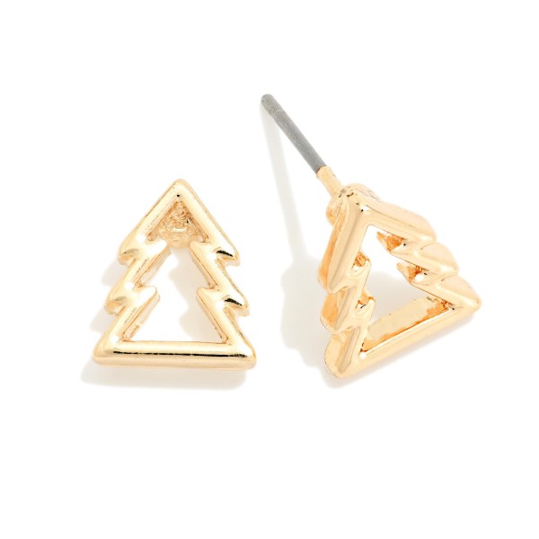 Open Christmas Tree Stud Earrings in polished metal with a modern cutout tree outline. Minimal and lightweight on post backs, they add a subtle festive touch to everyday holiday outfits. A sweet pick for office parties, teacher gifts, stocking stuffers and anyone who prefers understated holiday style. Simple holiday studs at an easy price that sell to every age.