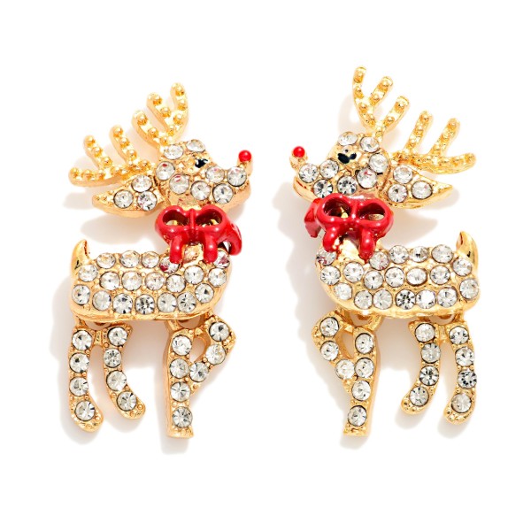 Rhinestone Reindeer Drop Earrings covered in sparkling stones with a glossy enamel bow and a tiny nose accent. The glamorous holiday shape hangs from a post back for a secure, comfortable fit. A festive statement for Christmas parties, holiday concerts, and New Year's events. Sparkly holiday novelty earrings are proven sellers that shoppers buy for themselves and as gifts.