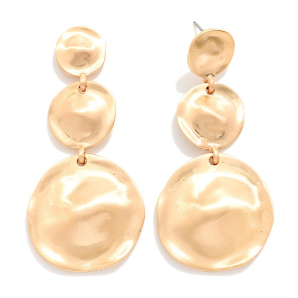 Graduated Disc Drop Earrings linking three hammered metal discs that grow from a small post top to an oversized coin. The wavy texture in a soft matte finish catches the light without feeling flashy, and the build stays light for all day wear. Easy to style with knits, denim and holiday dresses. A sculptural statement drop that fits right into the organic metal trend.