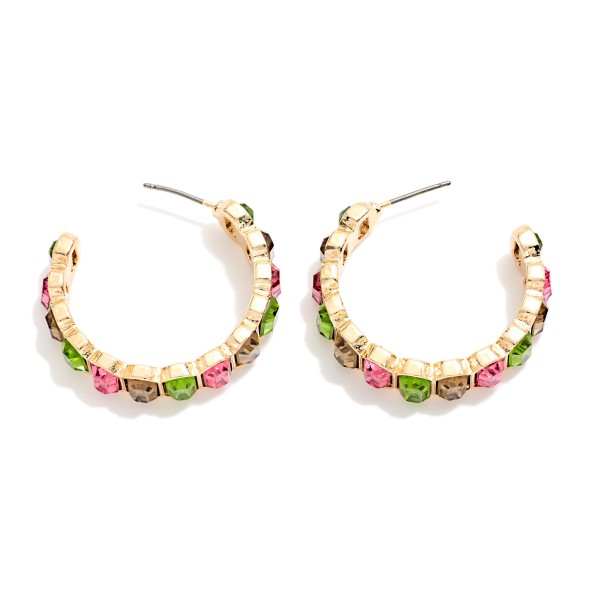 Crystal Lined Hoop Earrings with a row of round faceted stones set in polished bezels all the way around a slim open hoop. Post backs and a lightweight build make them easy to wear from day to night. A sparkling choice for holiday events, weddings, date nights and everyday glam. Classic jeweled hoops at an easy price that keep boutiques reordering.
