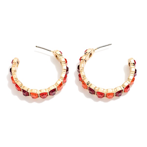 Crystal Lined Hoop Earrings with a row of round faceted stones set in polished bezels all the way around a slim open hoop. Post backs and a lightweight build make them easy to wear from day to night. A sparkling choice for holiday events, weddings, date nights and everyday glam. Classic jeweled hoops at an easy price that keep boutiques reordering.