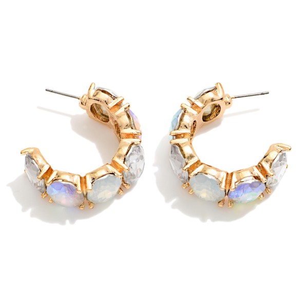 Crystal Hoop Earrings lined with oval faceted stones in polished prong settings for a bold, jeweled open hoop. Post backs keep them secure, and the C hoop shape sits close to the ear for all night comfort. Perfect for holiday parties, weddings, date nights and New Year's Eve. A glam statement hoop that sells fast in every colorway on display.