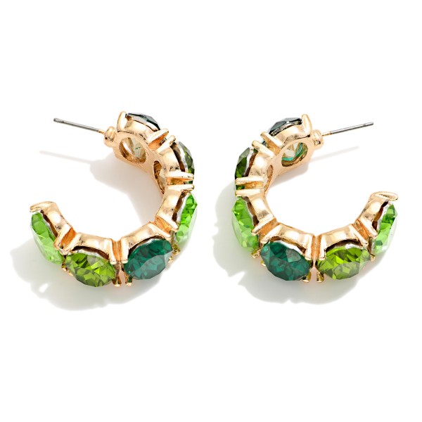 Crystal Hoop Earrings lined with oval faceted stones in polished prong settings for a bold, jeweled open hoop. Post backs keep them secure, and the C hoop shape sits close to the ear for all night comfort. Perfect for holiday parties, weddings, date nights and New Year's Eve. A glam statement hoop that sells fast in every colorway on display.