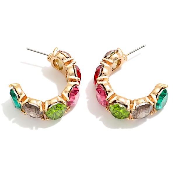 Crystal Hoop Earrings lined with oval faceted stones in polished prong settings for a bold, jeweled open hoop. Post backs keep them secure, and the C hoop shape sits close to the ear for all night comfort. Perfect for holiday parties, weddings, date nights and New Year's Eve. A glam statement hoop that sells fast in every colorway on display.
