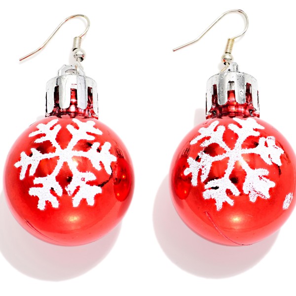 Snowflake Ornament Ball Drop Earrings designed like a mini Christmas ornament, with a glossy bauble, frosted snowflake detail, and a classic ornament cap on lightweight fishhook wires. Featherlight construction makes these bold, round drops comfortable for all day wear. Perfect for tree trimming parties, Christmas Eve services, and festive family photos. A nostalgic holiday favorite that shoppers love to gift, so plan to reorder before the season peaks.