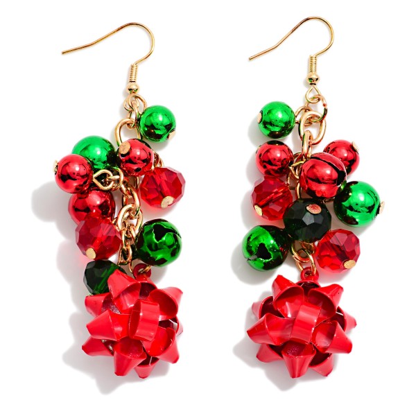 Holiday Bead Cluster Drop Earrings with a lively cascade of metallic and faceted crystal beads, finished with a shiny gift bow charm at the bottom. Lightweight fishhook wires let the cluster swing and catch the light with every move, adding instant festive sparkle. Fun for Christmas parties, gift exchanges, and holiday shopping trips. A cheerful statement style at an impulse friendly price that brightens any seasonal jewelry display.