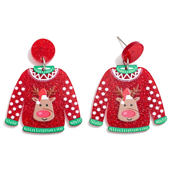 Ugly Christmas Sweater Drop Earrings featuring a glitter acrylic sweater with a sweet reindeer face, snowflake sleeves, and a matching glitter post top. Lightweight acrylic keeps these oversized earrings comfortable for hours of holiday fun. Made for ugly sweater parties, office contests, and school spirit days. A playful, eye catching novelty style that customers buy for themselves and their friends, so stock deep for December.