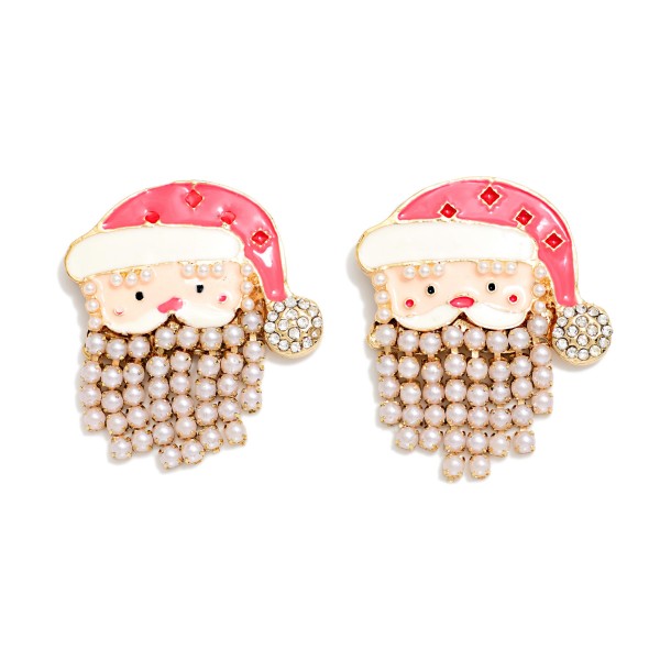 Santa Claus Pearl Beard Earrings with an enamel Santa face, a rhinestone pom pom on his hat, and a playful fringe beard of tiny faux pearls that sways with every turn. These whimsical post earrings add a dose of holiday cheer to sweaters, party outfits, and Christmas morning pajamas. A fun conversation starter for teachers, nurses, and anyone who loves to dress for the season. A giftable holiday favorite that boutique shoppers grab for themselves and for stocking stuffers.