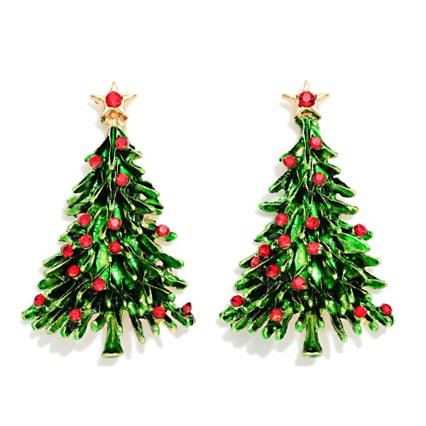 Christmas Tree Rhinestone Earrings with glossy enamel branches, sparkling rhinestone ornaments, and a shining star topper. Comfortable post backs keep these festive statement earrings easy to wear from the office party to Christmas morning. A cheerful holiday look for ugly sweater contests, family photos, and holiday markets alike. Priced as an easy impulse buy, these merry earrings fly off countertop displays all season and make the perfect stocking stuffer or teacher gift.