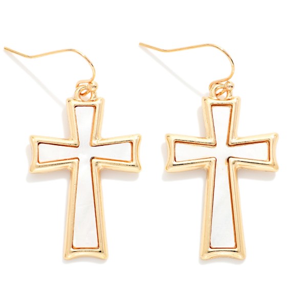 Pearlescent Cross Drop Earrings featuring a framed cross with a shimmering pearl look inlay, hanging from fishhook wires. The soft luster gives a classic cross design a fresh, elegant feel. Lightweight and comfortable for all day wear. A meaningful gift for baptisms, first communions, and Easter, and a steady seller for faith inspired boutique displays.