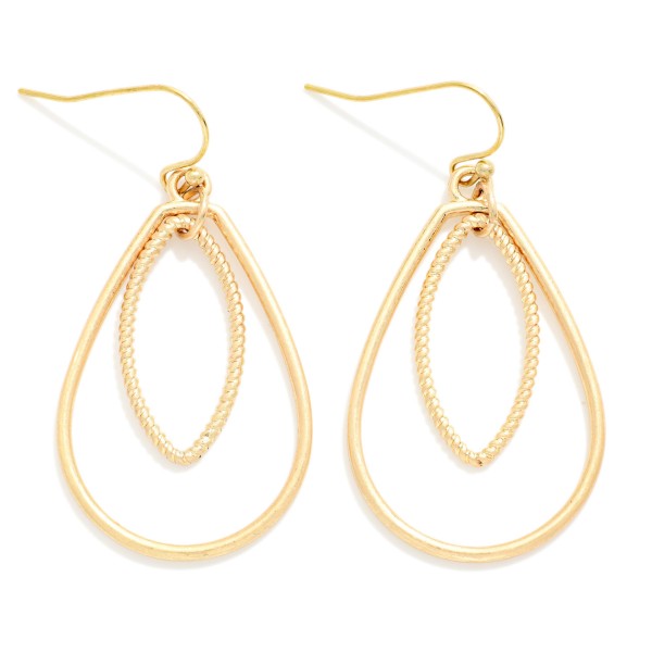 Textured Teardrop Drop Earrings featuring an open teardrop frame with a beaded marquise shape layered inside. The nested silhouette creates dimension and catches the light with every turn. Lightweight fishhook wires keep them comfortable all day. An elegant everyday earring that dresses up a simple outfit, perfect for work, church, and weekend wear.