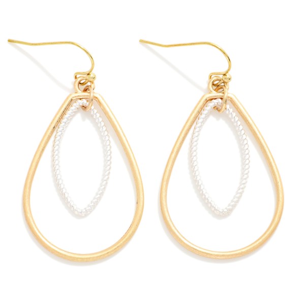 Textured Teardrop Drop Earrings featuring an open teardrop frame with a beaded marquise shape layered inside. The nested silhouette creates dimension and catches the light with every turn. Lightweight fishhook wires keep them comfortable all day. An elegant everyday earring that dresses up a simple outfit, perfect for work, church, and weekend wear.