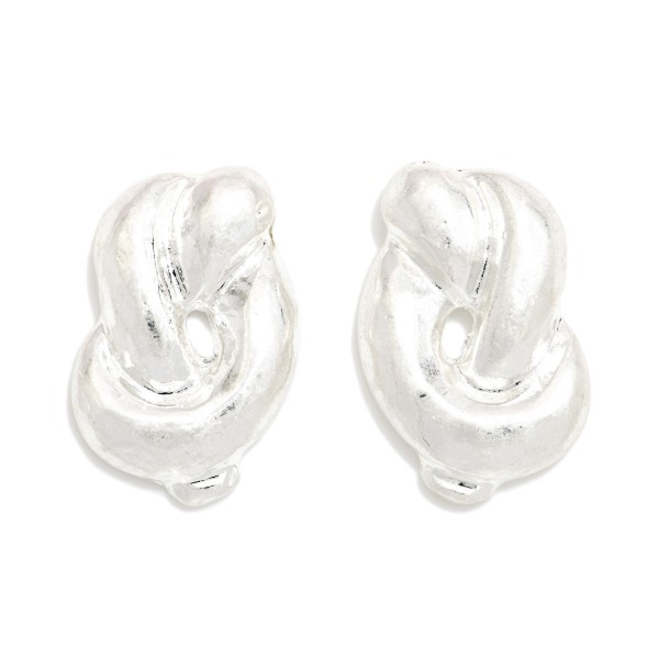 Chunky Knot Stud Earrings with a sculpted, puffy knot design in a soft brushed metal finish. The bold, dimensional shape makes a statement while staying close to the ear. Post backs for secure, comfortable wear. A polished everyday earring that works with casual and dressy looks, and a dependable seller for customers who love chunky metal styles.