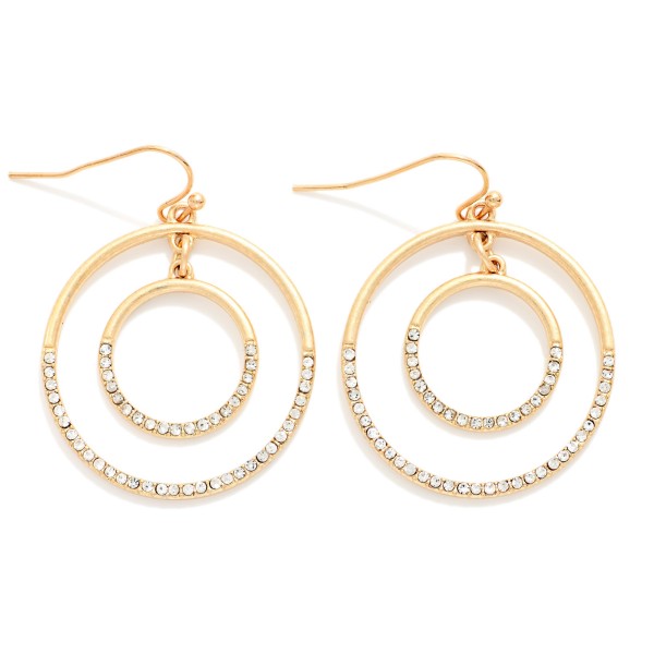 Rhinestone Double Hoop Drop Earrings featuring an open outer hoop framing a sparkling rhinestone inner ring, suspended from fishhook wires. The circle within a circle design adds dimension and a touch of shine without feeling heavy. Easy to dress up for holiday parties and events or wear every day. A sparkly, affordable style that makes a great gift and pairs with the coordinating pave circle pendants.