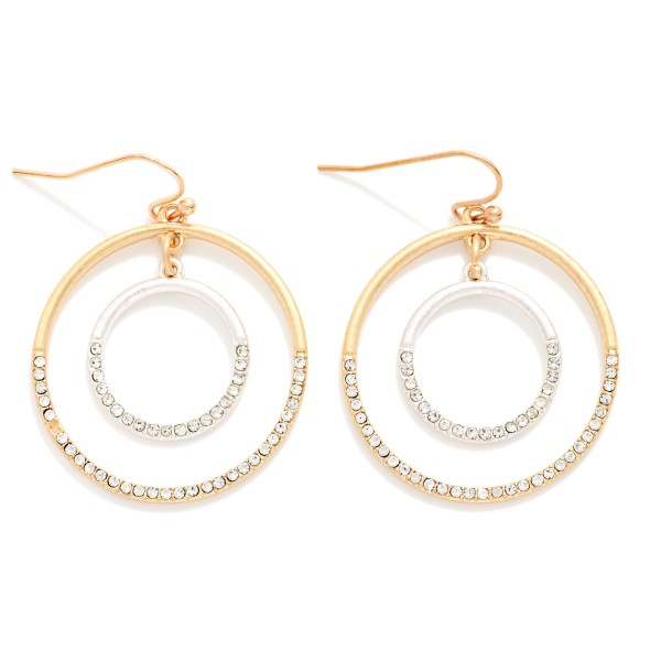 Rhinestone Double Hoop Drop Earrings featuring an open outer hoop framing a sparkling rhinestone inner ring, suspended from fishhook wires. The circle within a circle design adds dimension and a touch of shine without feeling heavy. Easy to dress up for holiday parties and events or wear every day. A sparkly, affordable style that makes a great gift and pairs with the coordinating pave circle pendants.