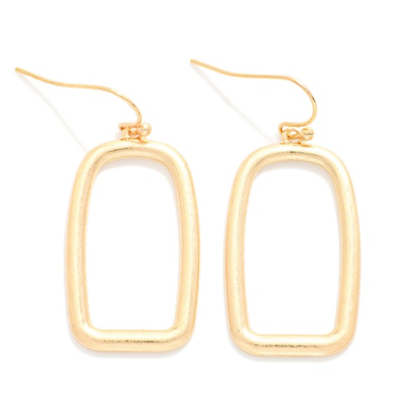 Open Rectangle Drop Earrings with a clean geometric outline in a soft brushed finish, hung from lightweight fishhook wires. The minimal, architectural shape feels modern and pairs with everything from workwear to weekend outfits. Light enough for all day comfort. A simple, on trend earring at an easy price point, perfect for building out an everyday metal earring display.