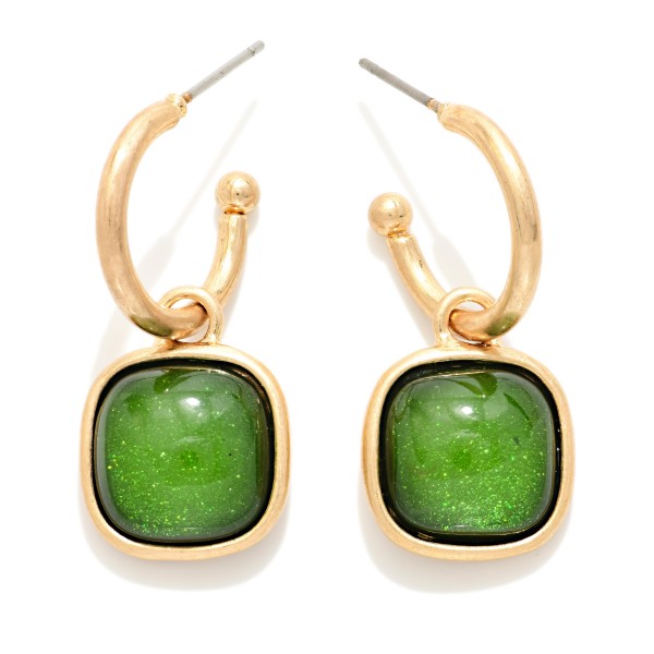 Cushion Stone Hoop Charm Earrings with a framed square cabochon stone that dangles from a polished open hoop. The bold stone and clean metal pairing makes these an easy statement for holiday parties, date nights, and dressing up everyday outfits. Lightweight post backs for comfortable wear. Offered in several stone options, they're a natural upsell alongside the coordinating square stone necklaces and bracelets.