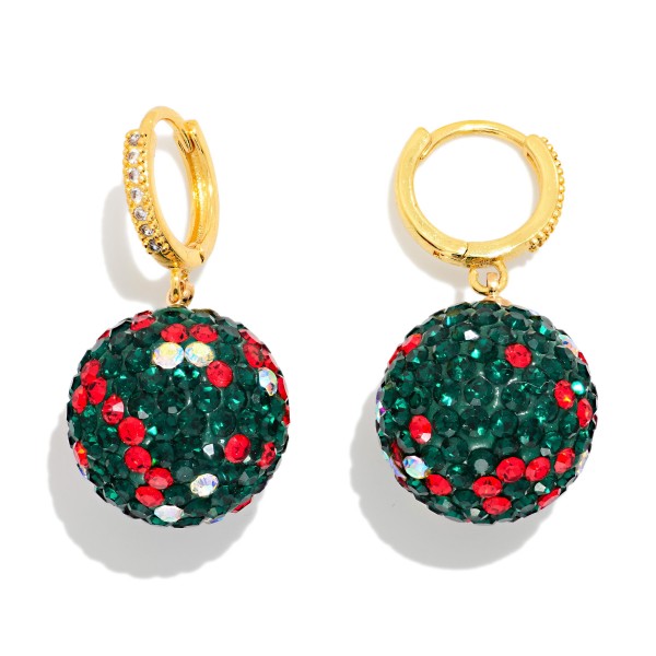 Rhinestone Ornament Ball Huggie Drop Earrings with sparkling pave crystal spheres that look just like a glittering holiday ornament, suspended from a rhinestone accented huggie hoop. Full coverage stones catch light from every angle, and the snug huggie closure keeps them secure and comfortable through parties and family gatherings. A festive pick for Christmas parties, ugly sweater nights, and holiday photos. Bright, giftable, and eye catching on a display, these sell quickly all season long.