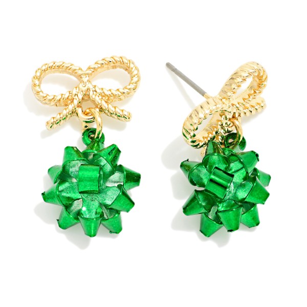 Christmas Gift Bow Drop Earrings featuring a textured rope bow post with a festive present style bow dangling below. Lightweight construction keeps them comfortable through holiday parties, school programs, and family gatherings. A playful pick for teachers, ugly sweater nights, and gift exchanges. Seasonal earrings like these sell through quickly from November into December, so they are a smart early stock up.