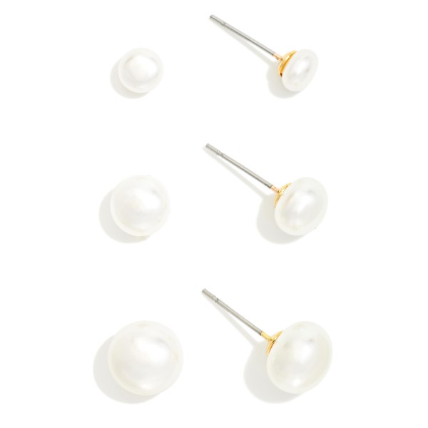 Pearl Stud Earring Set with three pairs of classic round faux pearl studs in graduated sizes. Mix and match them across multiple piercings or rotate through the week for a timeless, polished finish. Lightweight posts make them comfortable for all day wear at the office, weddings, and everyday errands. Pearl studs never go out of style, and a value packed trio like this is an easy impulse add and a reliable gift for any boutique jewelry display.