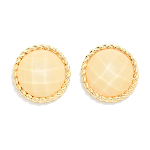 Faceted Stone Button Stud Earrings with a round cabochon framed by a twisted rope edge. The faceted surface reflects light softly, giving these studs a vintage inspired richness that works from the office to dinner out. Comfortable post backs and a lightweight build make them easy to wear all day. Bold button studs are a top fall trend, and this classic shape is a dependable seller that pairs with everything from turtlenecks to blazers.