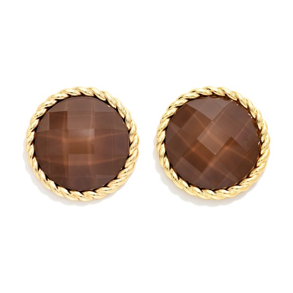 Faceted Stone Button Stud Earrings with a round cabochon framed by a twisted rope edge. The faceted surface reflects light softly, giving these studs a vintage inspired richness that works from the office to dinner out. Comfortable post backs and a lightweight build make them easy to wear all day. Bold button studs are a top fall trend, and this classic shape is a dependable seller that pairs with everything from turtlenecks to blazers.