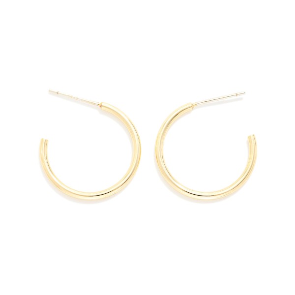 Thin Open Hoop Earrings in a sleek, lightweight metal with a simple post back closure. The slim C shape hoop sits close to the ear for an effortless everyday look that layers beautifully with studs and huggies. Comfortable enough to wear from morning to night and polished enough for the office. Classic hoops are a year round staple and a must stock basic that keeps boutique earring displays selling.