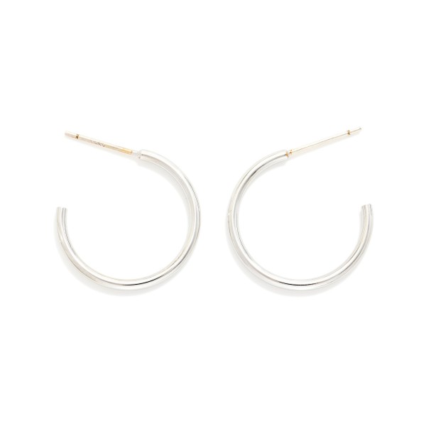 Thin Open Hoop Earrings in a sleek, lightweight metal with a simple post back closure. The slim C shape hoop sits close to the ear for an effortless everyday look that layers beautifully with studs and huggies. Comfortable enough to wear from morning to night and polished enough for the office. Classic hoops are a year round staple and a must stock basic that keeps boutique earring displays selling.