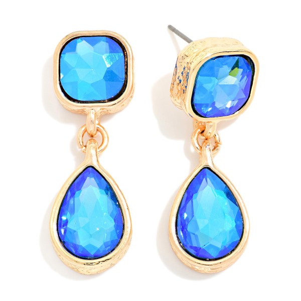 Crystal Teardrop Drop Earrings featuring a cushion cut glass stone at the ear and a faceted teardrop that dangles below, each set in a polished bezel. The double stone design catches light with every movement, making them ideal for weddings, proms, holiday parties, and nights out. Lightweight post backs keep them comfortable for hours. Sparkling drop earrings are a top gifting category, and this classic silhouette appeals to shoppers of every style.