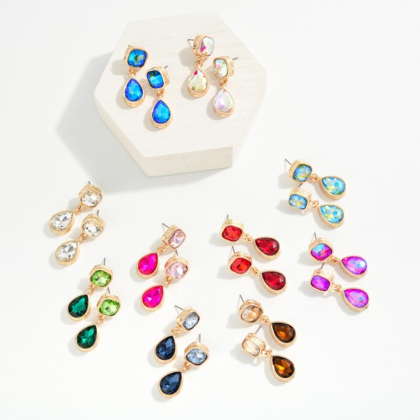 Crystal Teardrop Drop Earrings featuring a cushion cut glass stone at the ear and a faceted teardrop that dangles below, each set in a polished bezel. The double stone design catches light with every movement, making them ideal for weddings, proms, holiday parties, and nights out. Lightweight post backs keep them comfortable for hours. Sparkling drop earrings are a top gifting category, and this classic silhouette appeals to shoppers of every style.