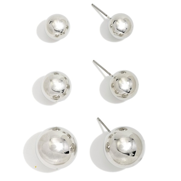 Ball Stud Earring Set with three pairs of polished metal ball studs in small, medium, and large sizes. Wear one pair for a clean minimalist look or stack all three across multiple piercings. Lightweight posts make them comfortable for everyday wear, from the gym to the office. Classic ball studs are an essential basic that customers come back for again and again, and a value trio like this makes an easy gift and quick add on sale.