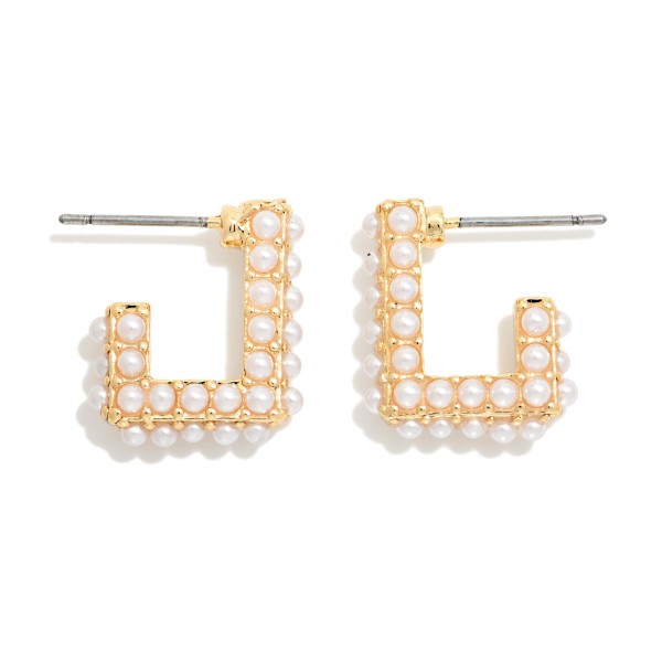 Pearl Studded Square Hoop Earrings with a row of faux pearls set along an open square frame. The geometric shape gives classic pearls a modern twist that works for the office, brunch, or a night out. Lightweight with secure post backs for comfortable all day wear. A fresh, trend forward pearl style that appeals to a wide range of customers and sells year round.