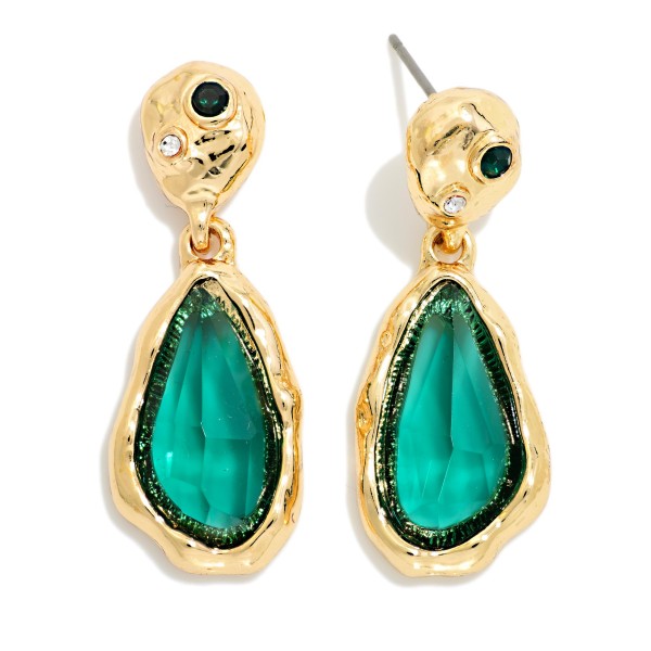 Glass Teardrop Earrings with a polished faceted drop hanging from a hammered oval post accented with a tiny stone. The rich, glossy stone adds a touch of elegance to holiday outfits and evening looks. Lightweight and comfortable for long events. An elegant, affordable style that boutique shoppers buy for parties and gifting alike.