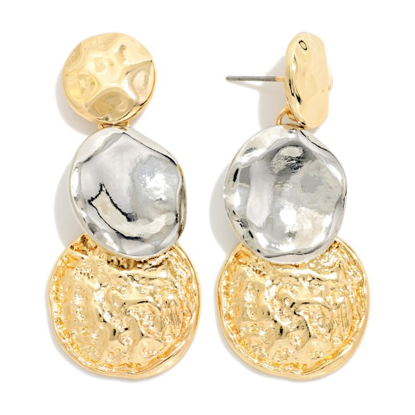 Two Tone Hammered Disc Drop Earrings stacking a textured post, an organic center disc, and a coin inspired bottom drop. The mixed metal finish and layered shapes create an artisan look that works with any jewelry a customer already owns. Lightweight and easy to wear from work to weekend. Mixed metal statement earrings are trending and give boutiques an easy, versatile seller.