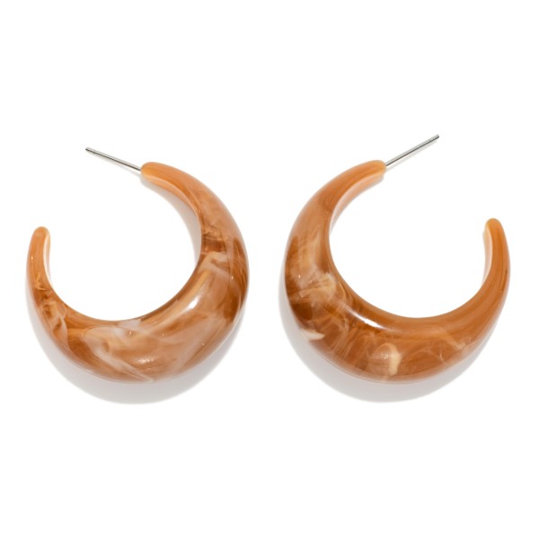 Chunky Marbled Resin Hoop Earrings with a thick, sculpted C shape and glossy swirled finish. Lightweight acetate keeps them comfortable despite their bold size. Perfect for fall outfits, sweater weather, and casual weekends. Statement resin hoops sell steadily in every season and make an easy add on for any boutique.