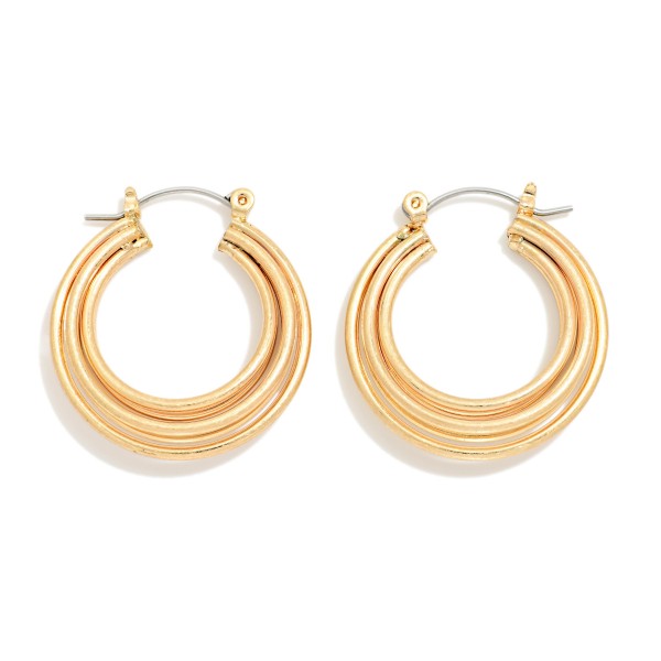 Ribbed Tube Hoop Earrings with a chunky, rounded profile and polished finish for a bold everyday look. Hinged hoop closures make them easy to put on and keep them secure all day. A versatile staple that pairs with everything from jeans and tees to dresses. Classic hoops are a year round best seller, and this textured update gives boutiques a fresh option to restock.