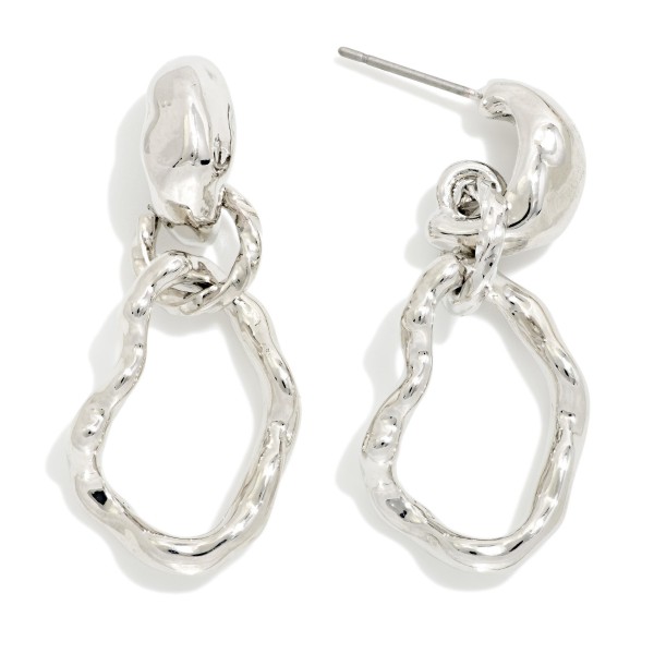 Twisted Knot Link Drop Earrings with sculpted, organic loops that interlock for a modern, artful silhouette. The polished metal finish catches the light and works with both casual and dressy outfits. Lightweight construction and post backs keep them comfortable all day. Sculptural metal earrings are a current trend that boutique shoppers reach for again and again.