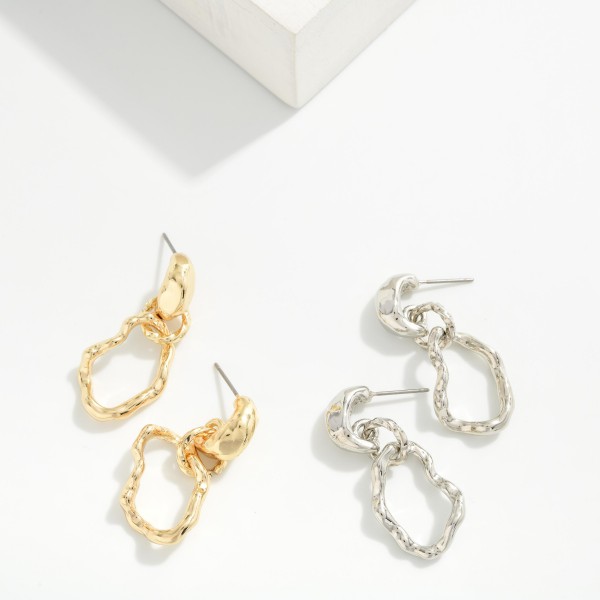 Twisted Knot Link Drop Earrings with sculpted, organic loops that interlock for a modern, artful silhouette. The polished metal finish catches the light and works with both casual and dressy outfits. Lightweight construction and post backs keep them comfortable all day. Sculptural metal earrings are a current trend that boutique shoppers reach for again and again.