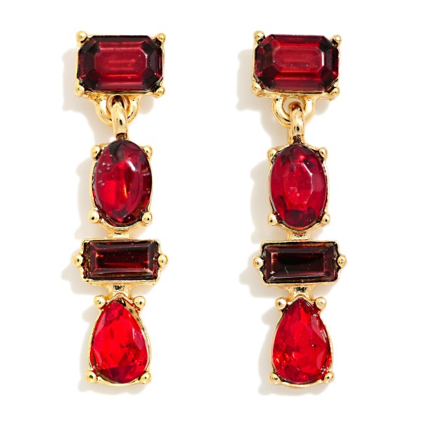 Tiered Glass Stone Drop Earrings stacking emerald cut, oval, baguette, and pear shaped stones in polished prong settings. The linear silhouette adds length and sparkle that elevates holiday outfits and evening looks. Post backs keep them secure and comfortable. Gem inspired statement earrings like these are a holiday must have and sell quickly for parties, weddings, and gifting.