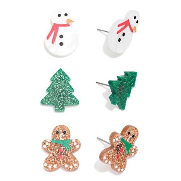 Holiday Stud Earring Set with three pairs of acrylic studs: a smiling snowman, a sparkly glitter Christmas tree and a glitter gingerbread man. Lightweight posts make them comfortable enough to rotate all season, from the first snowfall to Christmas morning. Great for kids, teachers, stocking stuffers and gift exchanges. Three looks at one easy price point means it sells as both a gift and a self purchase.