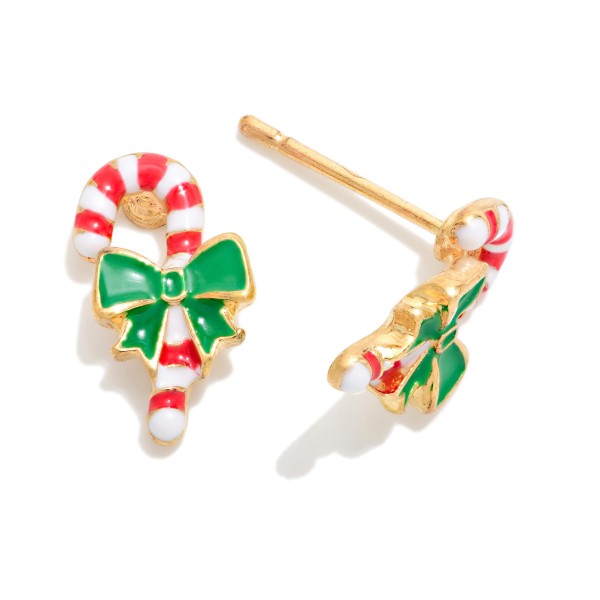 Candy Cane Bow Stud Earrings in glossy enamel with a polished metal finish. Each stud pairs a classic striped candy cane with a tied bow, small enough for everyday wear and comfortable on post backs all season long. Perfect for holiday parties, teacher gifts, Christmas cards and stocking stuffers. An easy impulse add at the register that moves fast from Thanksgiving through New Year's.