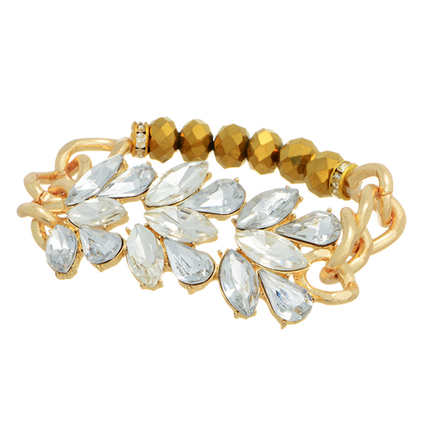 Gold tone chain link stretch bracelet featuring beads and crystal clear stone focal.