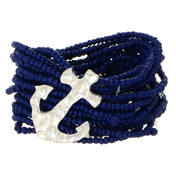 Stretch bracelet featuring multiple strand navy blue seed beads with silver tone hammered anchor. 